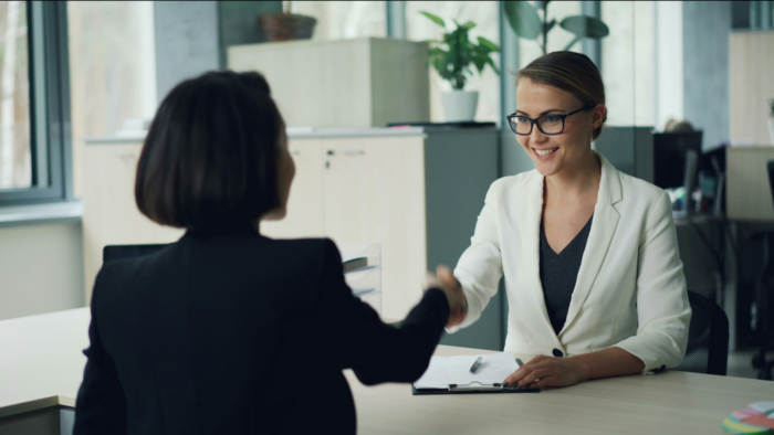 A professional image of a working professional calmly managing emotions, thinking positively, or interacting confidently with others. - write me a title for this based on this image