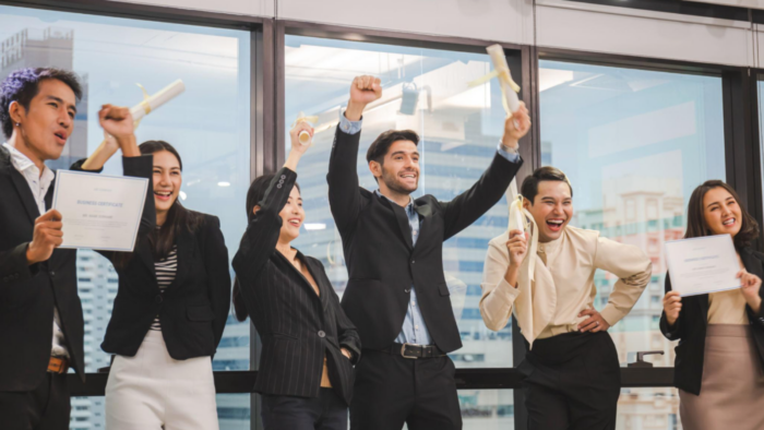 Professionals celebrating after completing a professional certification program at Inspire Training Academy, showcasing career growth and achievement.