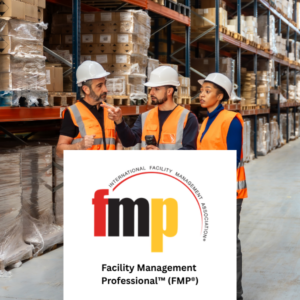 Warehouse facility management professionals wearing safety helmets and orange high-visibility vests discussing operations in a large storage warehouse, with the IFMA Facility Management Professional (FMP) certification logo displayed in the foreground.