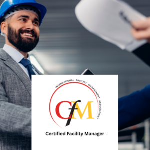 Professional facility manager wearing a blue safety helmet shaking hands during a workplace inspection, with documents in hand and the IFMA Certified Facility Manager (CFM) certification logo displayed in the foreground.