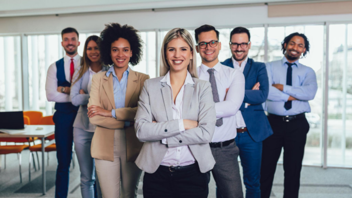 Confident professionals demonstrating workplace confidence and teamwork