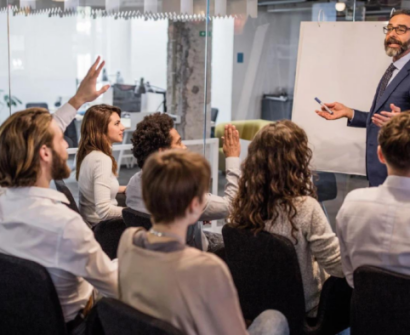 Employees participating in a professional training session to improve workplace skills