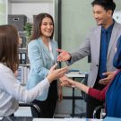 “Professionals building strong workplace relationships through interpersonal skills.”